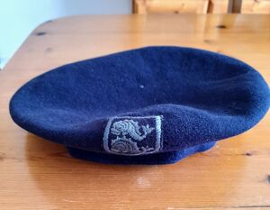 Beret with badge